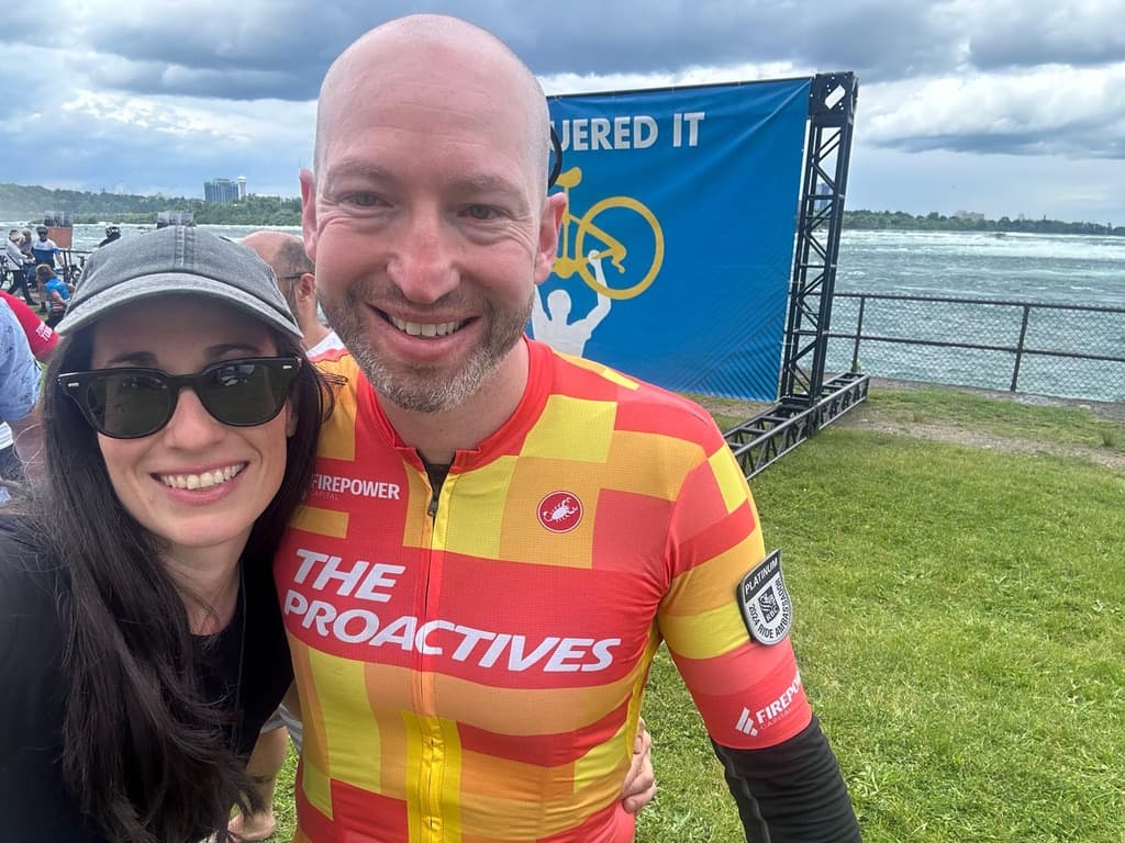 Jared Kalish with Karen Klein at the Ride to Conquer Cancer finish line